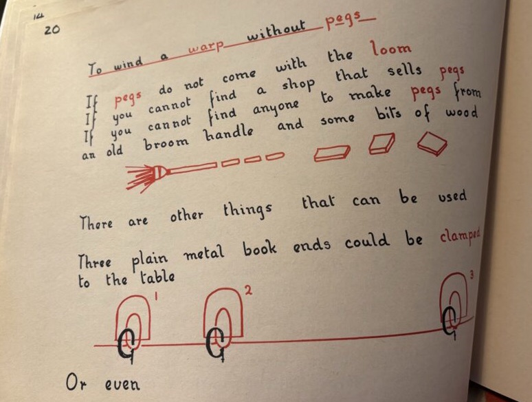 Page 20 of How to Weave, which offers a couple of descriptions of how to improvise pegs for warping, by making them out of bits of old broom handle, or clamping bookends to a table.