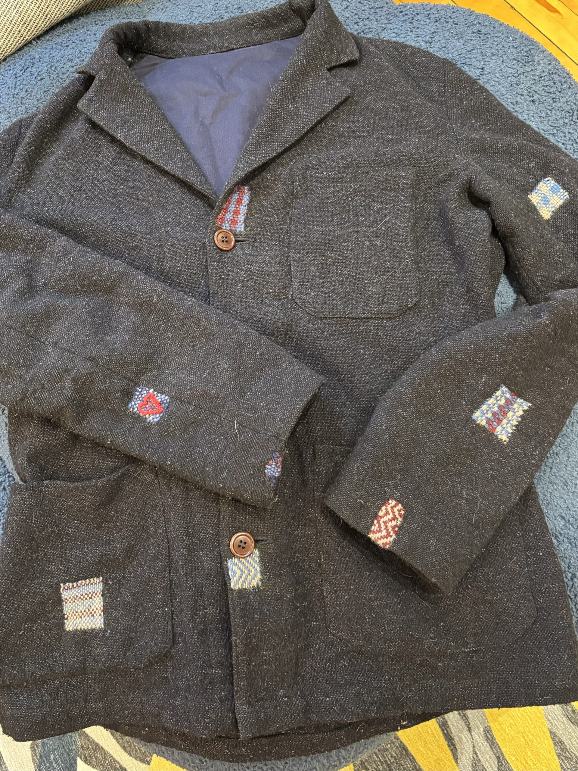 The front of the jacket, with 8 patches